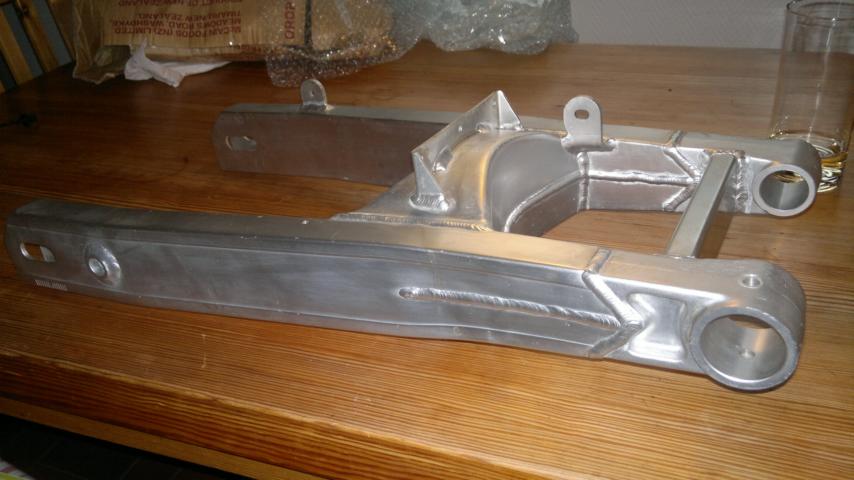 Brand new swingarm. A little dusty, but NEW!